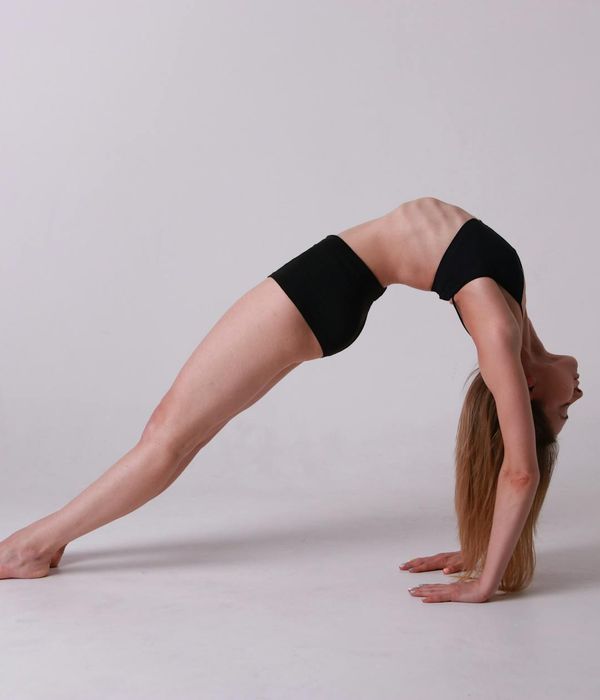 Person doing balanced yoga movements for flexibility