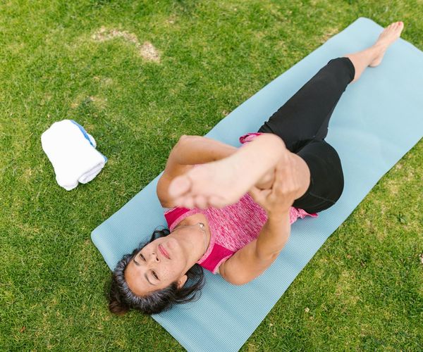 Person doing morning stretching routine for energy